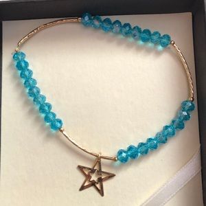 Gold and blue charm bracelet set